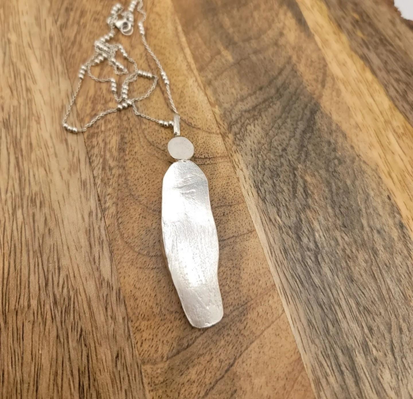 BROKEN INTO BEAUTIFUL ceramic broken china pendant feather design handmade in Sterling Silver metal with an apprx 18" chain